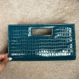 Mock-croc patent leather clutch